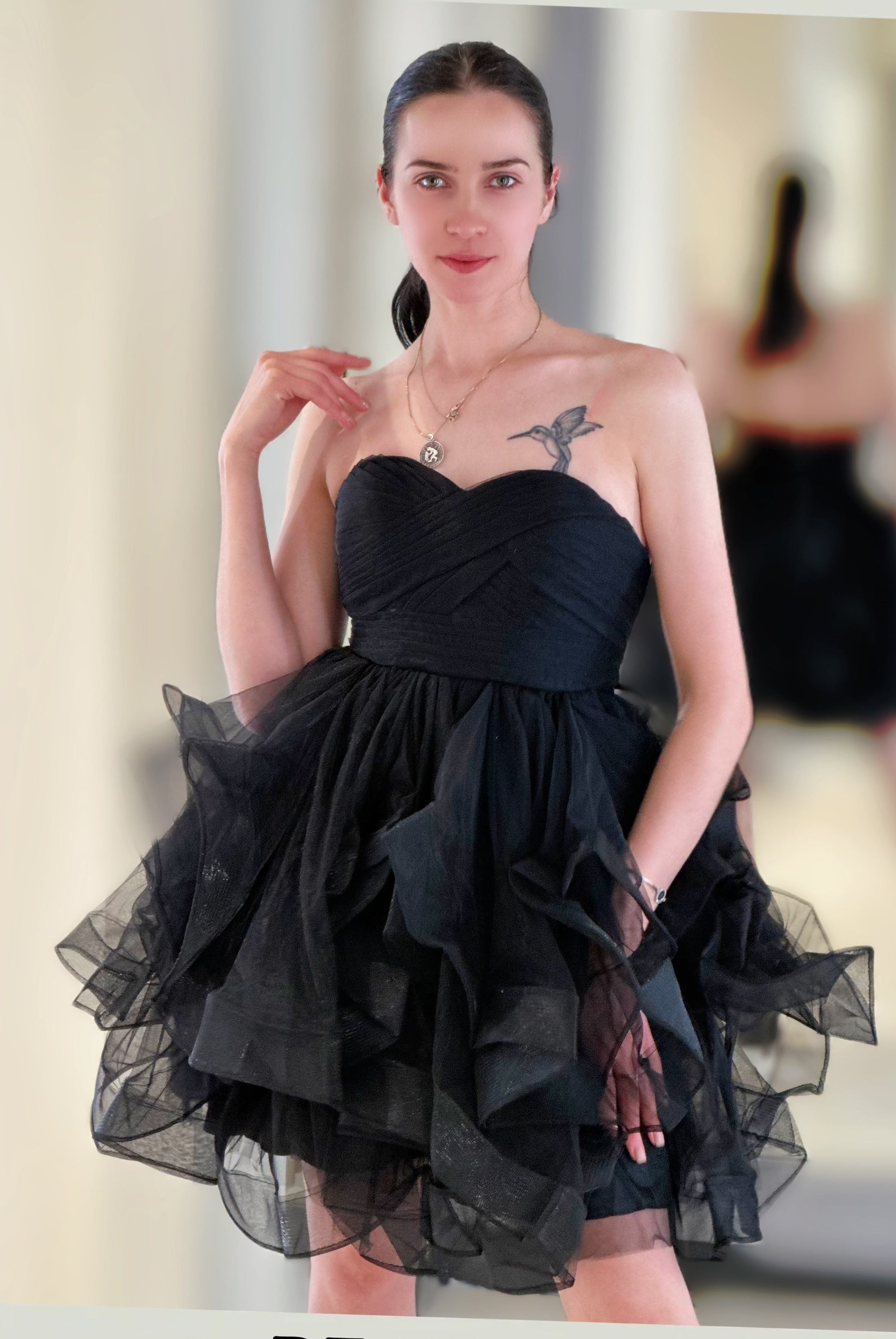 Abito gonfio, senza maniche, colore unito