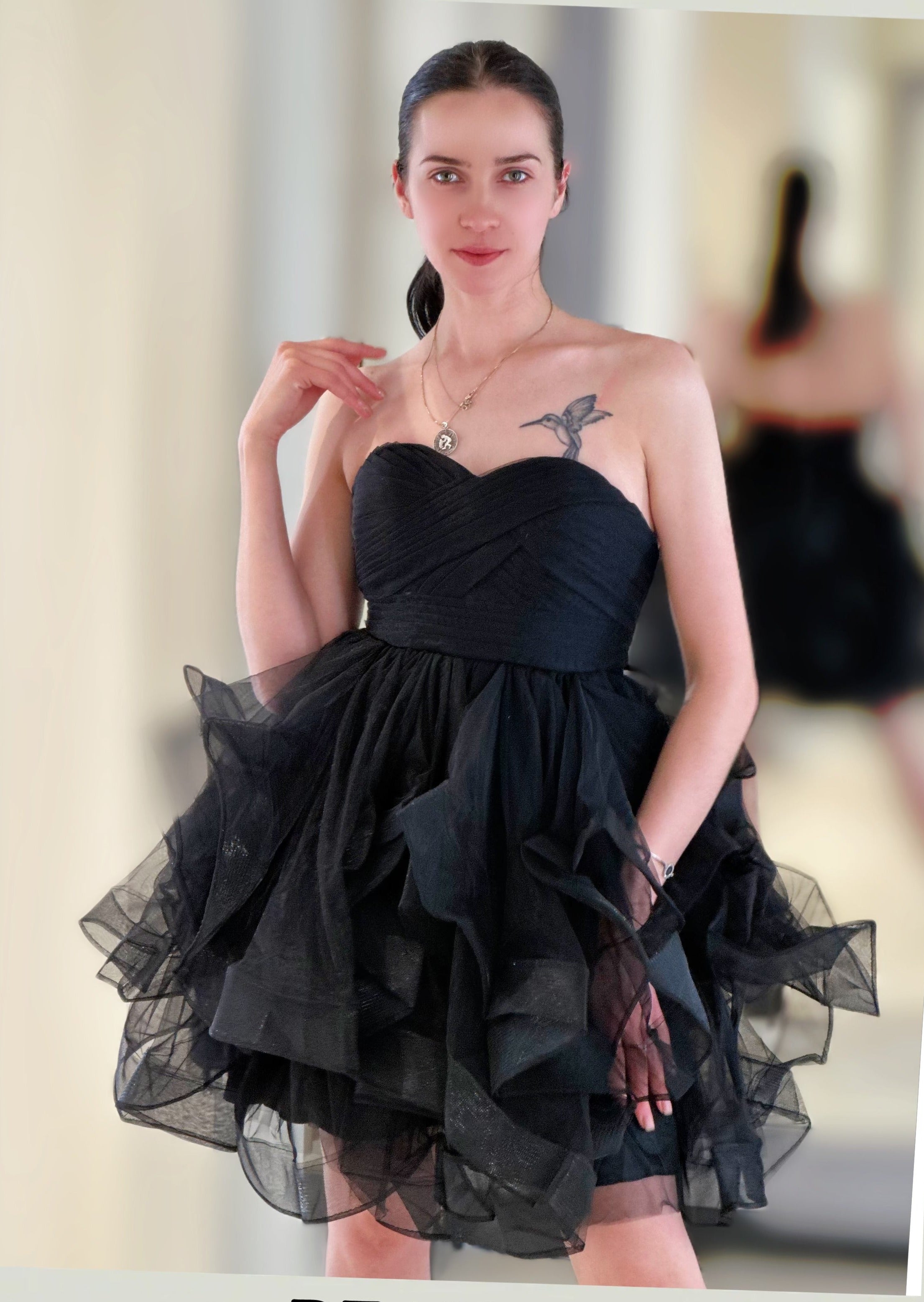 Abito gonfio, senza maniche, colore unito