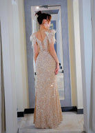 Abito lungo da sera con scollo a V e paillettes