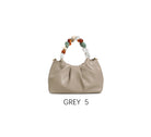 Borsa a mano con perle decorative e tracolla regolabile Grigio